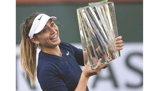 Paula Badosa of Spain holds the trophy after defeating Victoria Azarenka of Belarus in three sets in the final of the Indian Wells Masters. (USA TODAY Sports)