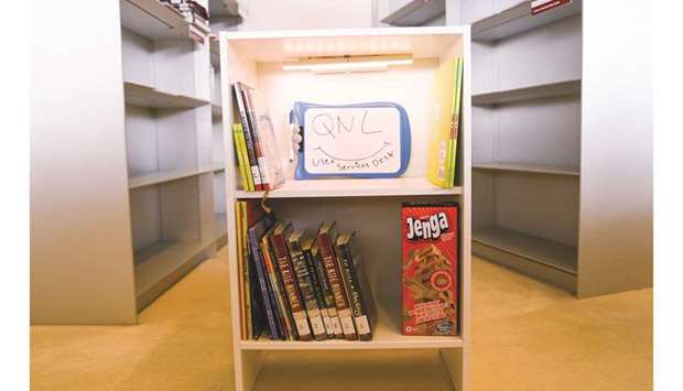 Mini-library shelf.