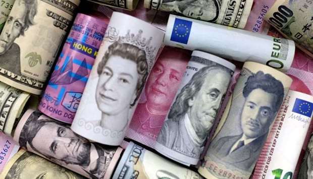 Euro, Hong Kong dollar, US dollar, Japanese yen, pound and Chinese 100 yuan banknotes are seen in this picture illustration. REUTERS
