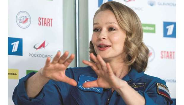 Actress Yulia Peresild gestures during an online news conference following the return from the International Space Station (ISS) in Star City, Russia, yesterday. (Reuters)