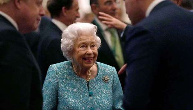 Britain's Queen Elizabeth, 95, spent a night in hospital for the first time in years for what Buckingham Palace termed ,preliminary investigations,, but was in good spirits and back at work at Windsor Castle.