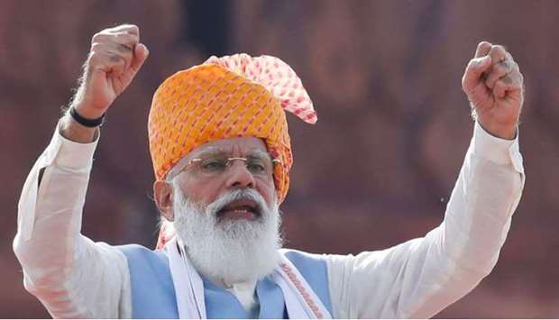 India's Prime Minister Narendra Modi said on Friday that economic growth was getting a boost from rising vaccinations across the country and urged citizens to purchase locally manufactured products over the upcoming festive season.