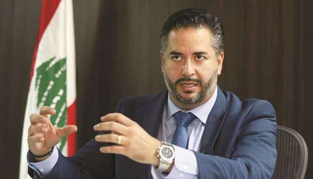 Lebanonu2019s Economy Minister Amin Salam speaks during an interview with Reuters in Beirut on October 22. Lebanon has lost precious time in dealing with the economic meltdown because of a crisis over the probe into the Beirut port explosion, which has paralysed the cabinet, he said.
