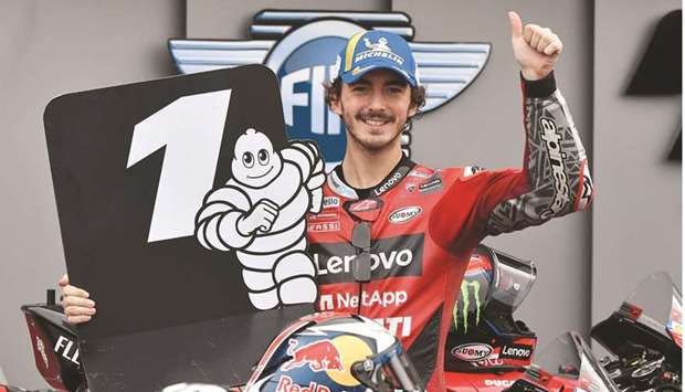 Ducati Lenovo Teamu2019s Francesco Bagnaia celebrates after qualifying in pole position for the Emilia Romagna Grand Prix in Misano, Italy, yesterday. (Reuters)