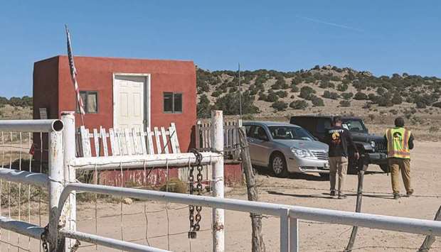 Security guards stand at the entrance of Bonanza Creek Ranch in Santa Fe, New Mexico. (AFP)