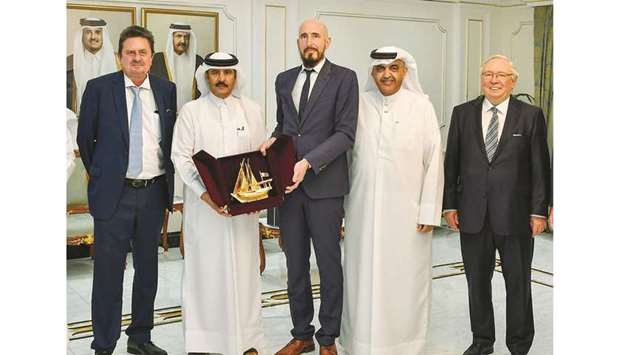 Qatar Chamber second vice chairman Rashid bin Hamad al-Athba handing over a token of recognition to Dr George Milanin, Policy Officer at the Division of Defence and Security Industries, Federal Ministry for Economic Affairs and Energy.