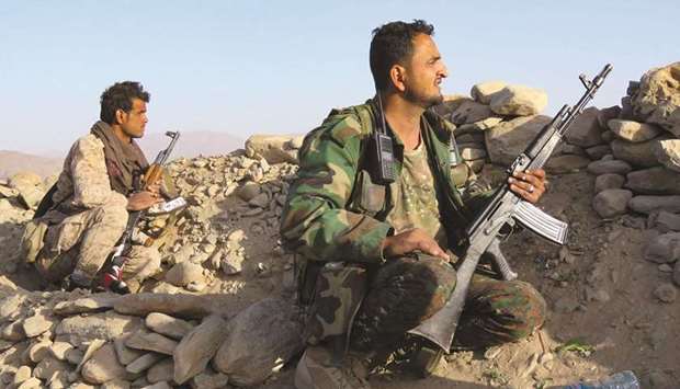 Fighters loyal to Yemenu2019s government man a position at the frontline facing Houthi rebels in the countryu2019s northeastern province of Marib.