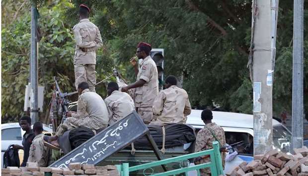 Members of Sudan's cabinet and a large number of pro-government party leaders were arrested on Monday in an apparent coup after weeks of tension between the military and a civilian government, political sources said.