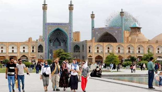Tourists visit the historic Naqsh-e Jahan Square in Isfahan. File photo/ AFP