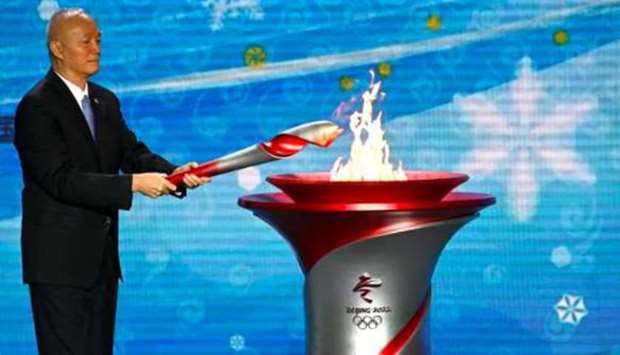 The Chinese capital will in February become the first host of a Summer and Winter Games, and last week welcomed the Olympic flame with a low-key ceremony.