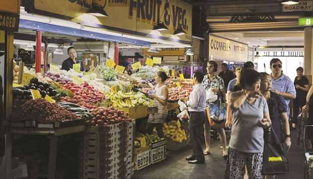 Shoppers inside the Adelaide Central Market. Australiau2019s three-year bond yield climbed to the highest level since July 2019 after consumer inflation picked up pace in the September quarter, strengthening rate-hike bets.