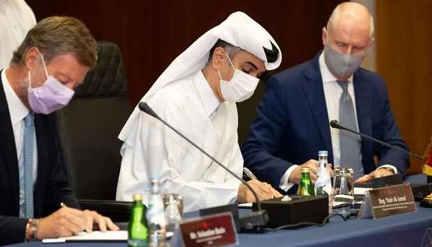 Officials at the signing of the agreement.