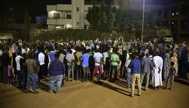 Sudanese youths take part in a protest in the capital Khartoum's Berri neighbourhood, amid ongoing demonstrations against a military takeover that has sparked widespread international condemnation