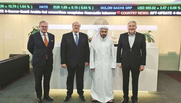 QFC chief executive Yousuf Mohamed al-Jaida with the officials of NEBIX, which established an office in the QFC.