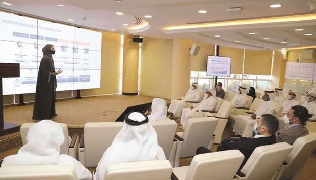 HE the Minister of Transport Jassim Seif Ahmed al-Sulaiti and officials during a briefing.