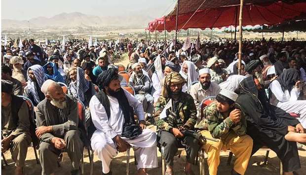 Taliban supporters attend an open air rally in a field in Kabul. AFP