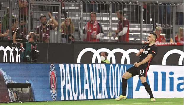 Eintracht Frankfurtu2019s Filip Kostic celebrates after scoring their second goal against Bayern Munich in their Bundesliga match at the Allianz Arena in Munich yesterday. (Reuters)