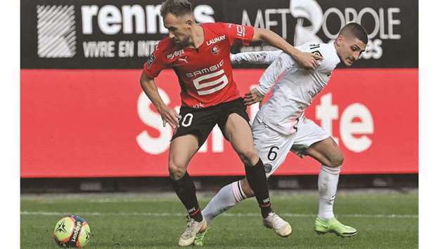 Paris Saint-Germainu2019s Marco Verratti (right) vying for the ball with Rennesu2019 Flavien Tait during the Ligue 1 match at the Roazhon Park in Rennes on yesterday. (AFP)