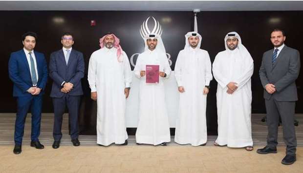 Abdulaziz bin Nasser al-Khalifa, chief executive of QDB and chairman of QFTH Taskforce, along with other officials, launch QFTHu2019s white paper.