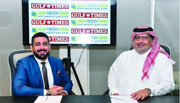 Faisal Abdulhameed al-Mudahka (right) and Malik Shishtawi signed an agreement