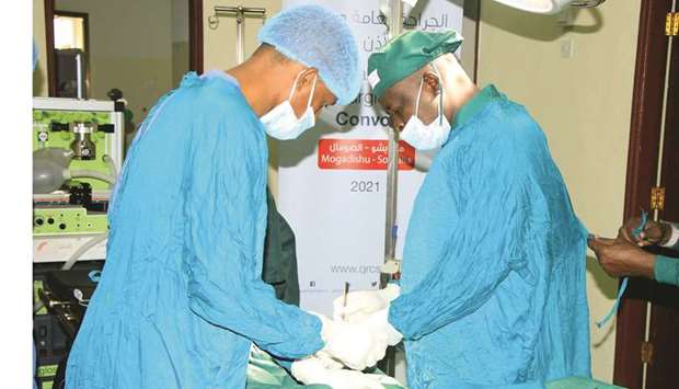 Patients in Somalia receive medical treatment from QRCS surgeons.