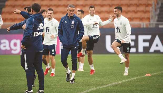 Spainu2019s head coach Luis Enrique (centre) looks on as his players attend a training session ahead of the Nations League semi-final against Italy at the San Siro stadium in Milan yesterday.
