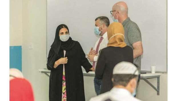 Dr Sheikha Aisha bint Faleh al-Thani during an interaction at a Doha Academy School.