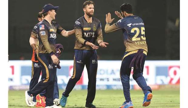Lockie Ferguson (second from right) of Kolkata Knight Riders celebrates the wicket of Jaydev Unadkat of Rajasthan Royals during the IPL match at the Sharjah Cricket Stadium in the UAE yesterday. (Sportzpics for IPL)