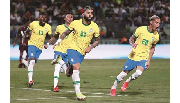 Brazilu2019s Gabriel Barbosa celebrates with teammates after scoring against Venezuela in the South American World Cup qualifiers at the Estadio Olimpico in Caracas, Venezuela, on Thursday. (Reuters)