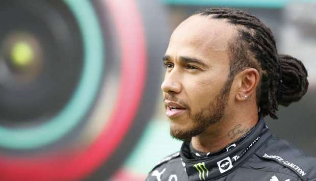 Mercedes' British driver Lewis Hamilton speaks to the press after the qualifying sessions at the Intercity Istanbul Park in Istanbul.