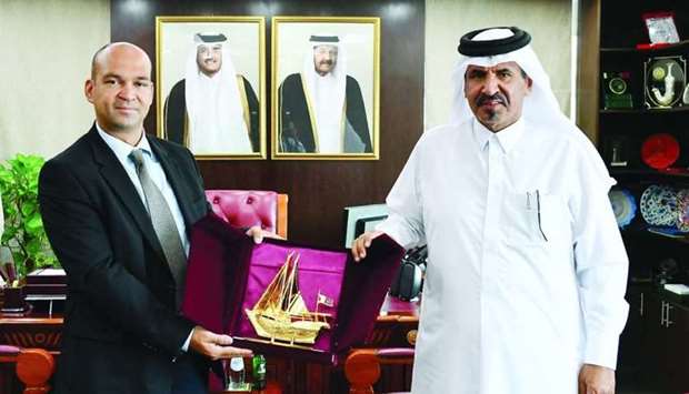 Qatar Chamber first vice chairman Mohamed bin Towar al-Kuwari hands over a token of recognition to Patrick Illing, the head of the Trade and Economic Affairs Section at the Delegation of the European Union in Riyadh.