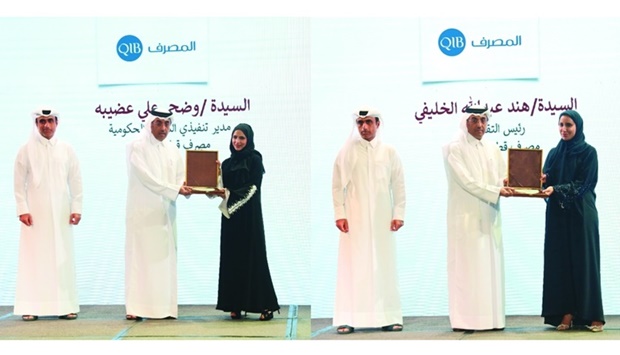 HE the Minister of Labour Dr Ali bin Samikh al-Marri presenting the award to Hind al-Khulaifi, head of Qatarisation, and Wadha Ali Odaiba, executive manager, Government Affairs at QIBu2019s Human Capital Group.