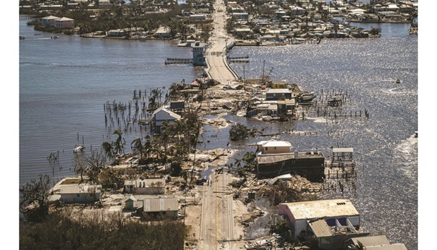 An aerial picture taken on Friday shows the only access to the Matlacha neighbourhood destroyed in the aftermath of Hurricane Ian in Fort Myers, Florida.