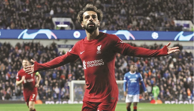 Liverpoolu2019s Mohamed Salah celebrates after scoring against Rangers  during the Champions League Group A match at the Ibrox Stadium, in Glasgow, Scotland on Wednesday. (Reuters)