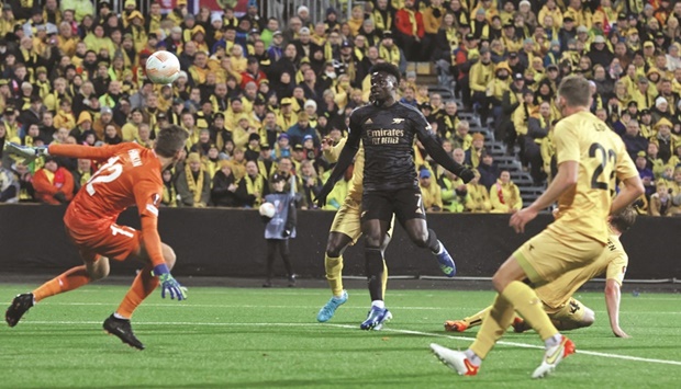 Arsenalu2019s Bukayo Saka (centre) scores against Bodo/Glimt in the Europa League at Aspmyra Stadion, Bodo, Norway. (Reuters)