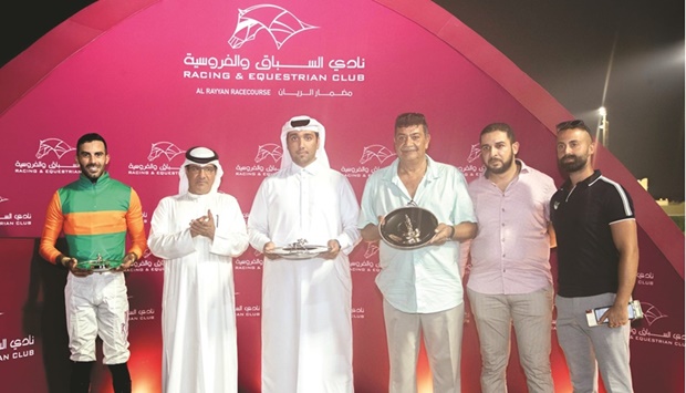 QREC Racing Manager Abdulla Rashid al-Kubaisi presented the trophies to connections of Al Shomos.