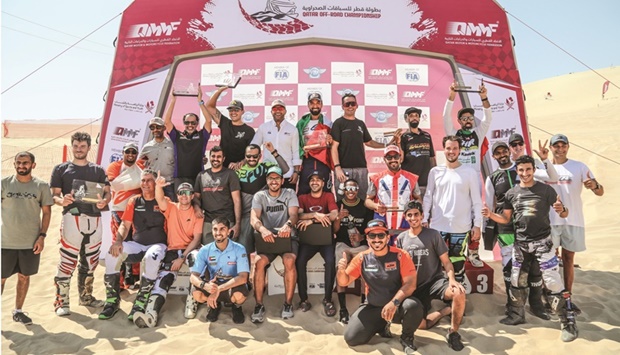Participants pose after the fifth and penultimate round of the 2022 Qatar Off Road Championship at Sealine yesterday.