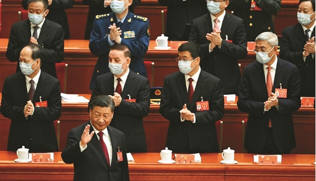 Chinau2019s President Xi Jinping gestures during the opening session of the 20th Chinese Communist Partyu2019s Congress at the Great Hall of the People in Beijing yesterday.