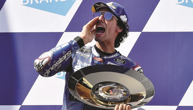 Suzuki Ecstaru2019s Spanish rider Alex Rins celebrates his Australian Grand Prix win at the Phillip Island yesterday. (AFP)