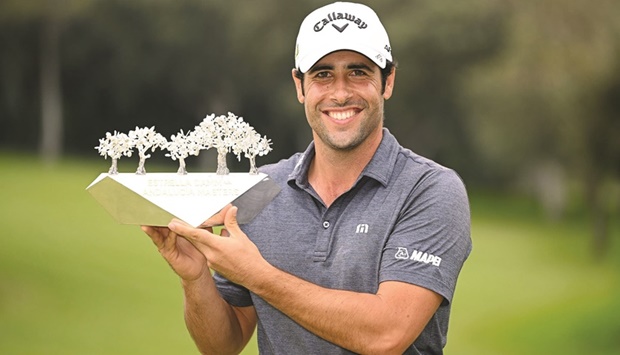 Adrian Otaegui poses with the trophy after winning the Andalucia Masters. (DP World Tour/Getty Image)