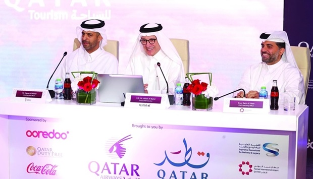 HE Akbar al-Baker, Nasser al-Khater and Badr al-Meer at the press conference