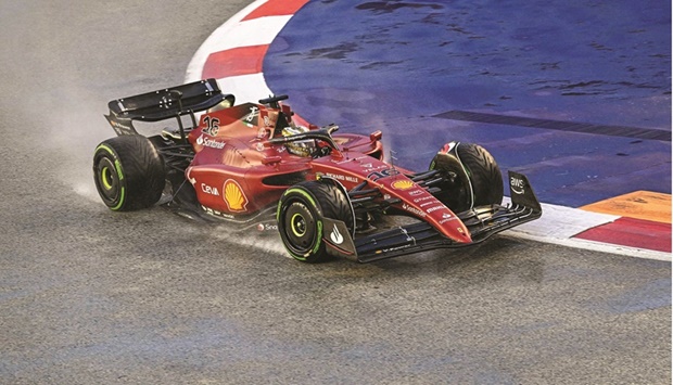 Ferrariu2019s Monegasque driver Charles Leclerc drives during a qualifying session on Satruday, ahead of the Formula One Singapore Grand Prix night race at the Marina Bay Street Circuit in Singapore. (AFP)