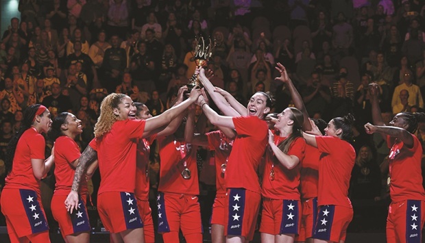 Team USA celebrate with the trophy after winning the 2022 FIBA Womenu2019s Basketball World Cup at the Superdome in Sydney, yesterday. (AFP)