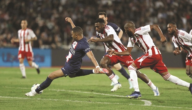 Paris Saint-Germainu2019s Kylian Mbappe shoots to score against Ajaccio during the French Ligue 1 match at the Francois Coty Stadium in Ajaccio, Corsica. (AFP)