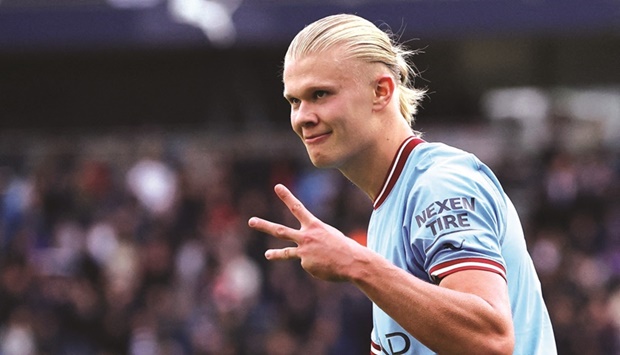 Manchester Cityu2019s Erling Braut Haaland celebrates scoring their fifth goal and completing his hat-trick against Manchester United during their Premier League match in Manchester yesterday. (Reuters)