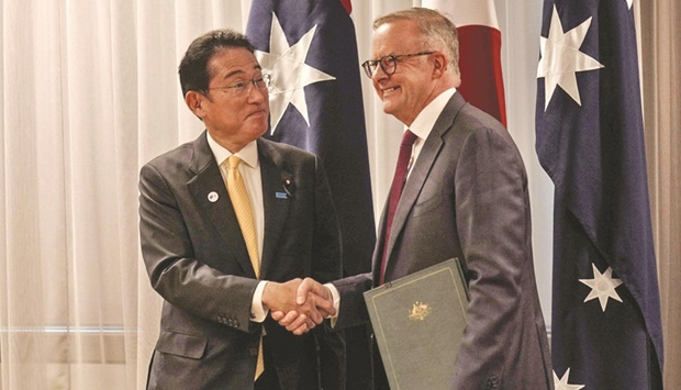 Australiau2019s Prime Minister Anthony Albanese shakes hands with Japanese Prime Minister Fumio Kishida during a press conference as part of their meeting in Perth, yesterday.