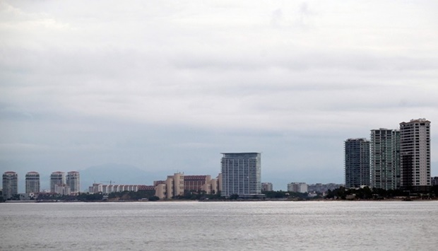 Picture of seafront buildings in the tourist area of Puerto Vallarta, Jalisco State, Mexico, taken Saturday, before the arrival of Hurricane Roslyn. AFP