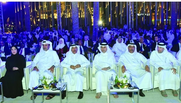 HE Dr Ahmed bin Hassan al-Hammadi, HE Maryam bint Abdullah al-Attiyah and other dignitaries at the event Monday. PICTURES: Thajudheen.