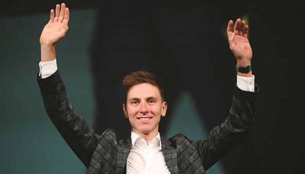 Slovenian rider Tadej Pogacar waves during the official presentation of the route of the 2023 Tour de France cycling race in Paris yesterday. (AFP)