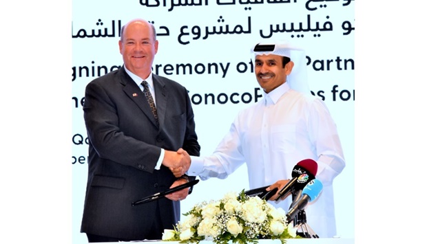 HE the Minister of State for Energy Affairs, Saad Sherida al-Kaabi, also the President and CEO of QatarEnergy, and Ryan Lance, Chairman and CEO of ConocoPhillips, at the agreement signing ceremony Sunday. PICTURE: Thajudheen.